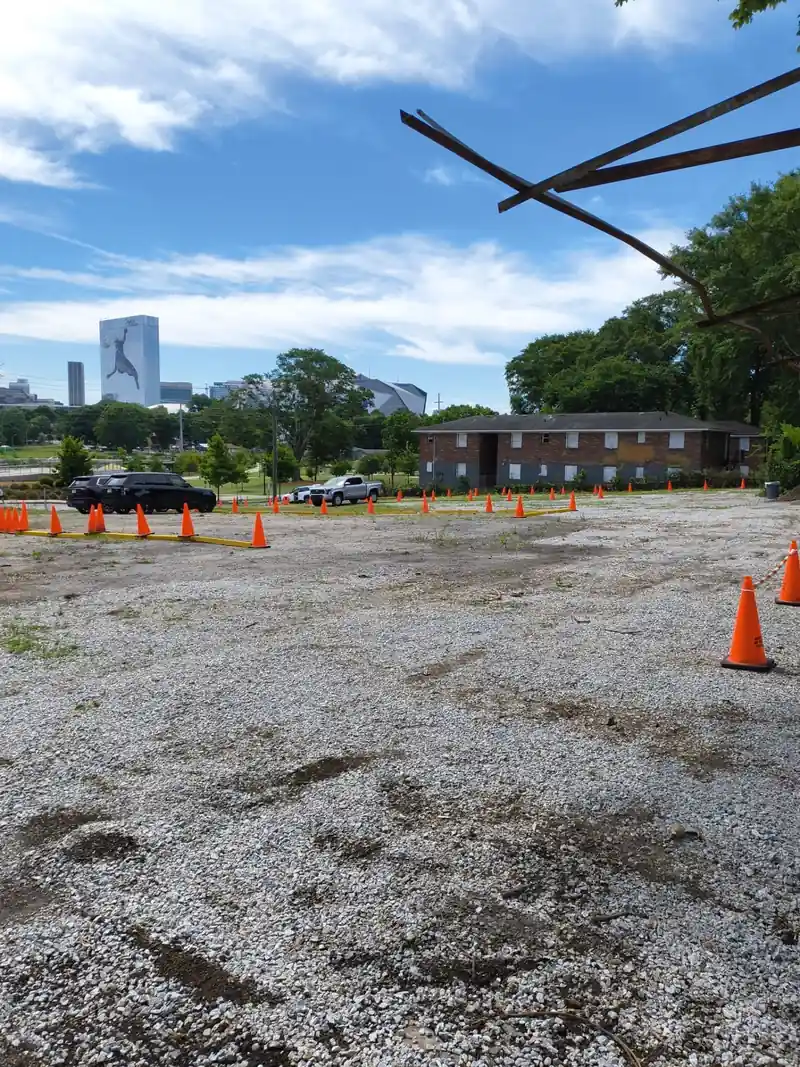 Parking lot with Mercedes-Benz Stadium visible in the distance
